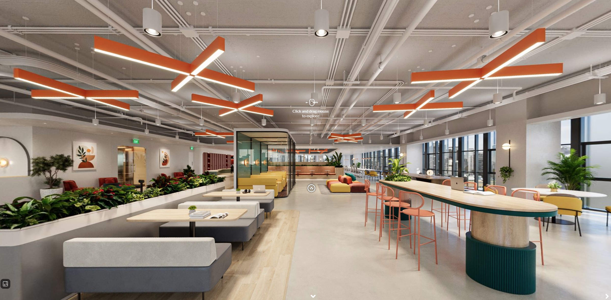 A bright, modern office space with high ceilings and exposed ductwork. The room features a variety of seating arrangements, including booths, tables, and bar-style seating. Unique orange cross-shaped light fixtures hang from the ceiling. Plants are interspersed throughout the space, adding a touch of greenery.